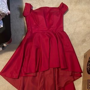 High Low red dress. Corset style top. Unknown brand and size. Fits size 15/16